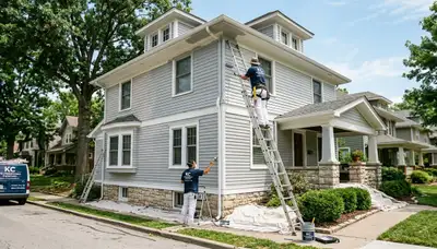 Professional house painters working on residential interior in Overland Park KS